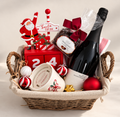 Hamp It Up x Kemeny’s Christmas hamper with Kemeny’s Hidden Label Pinot Noir Chardonnay, Paul’s chocolate hazelnuts, vanilla and sandalwood candle and Santa countdown blocks in a linen-lined woven basket