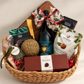 Hamp It Up x Kemeny’s Ultra Luxe Christmas hamper with Ulithorne Singularis Grenache, wooden serving board, gold cheese knife, artisan crackers, lemon myrtle macadamias and Paul’s chocolate truffles in a woven basket
