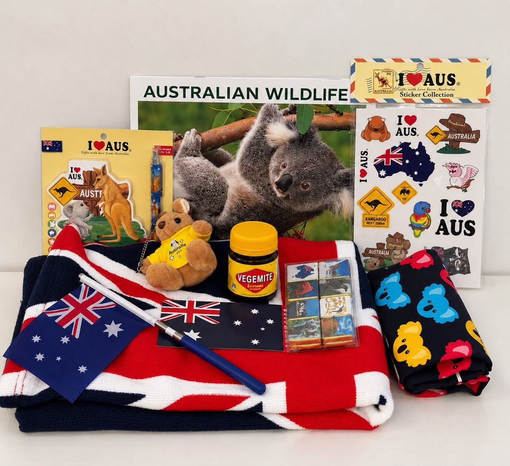 Welcome to Australia gift hamper with Vegemite, Australian flag, kangaroo soft toy and wildlife calendar in a white keepsake 