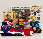 Welcome to Australia gift hamper with Vegemite, Australian flag, kangaroo soft toy and wildlife calendar in a white keepsake 