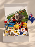 Welcome to Australia gift hamper with Vegemite, Australian flag, kangaroo soft toy and wildlife calendar in a white keepsake box