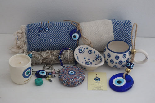 Be Protected evil eye gift hamper in blue and white with Turkish towel, evil eye mug, candle and protection stone in a Hamp It Up gift box